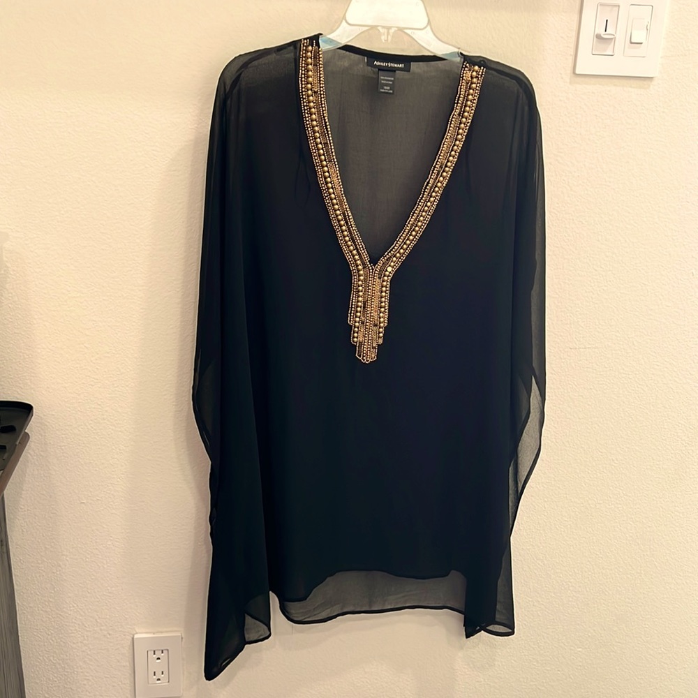 Black poncho with gold beaded detail
